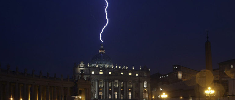 A flash of lighting is seen over St.Peter's Basilica during a rainstorm at Vatican in this picture provided by Ansa on February 11, 2013. Pope Benedict stunned the Roman Catholic Church on Monday when he announced he would stand down, the first pope to do so in 700 years, saying he no longer had the mental and physical strength to carry on. REUTERS/ANSA/ Alessandro Di Meo ( VATICAN - Tags: RELIGION) ATTENTION EDITORS - NO COMMERCIAL USE. NO MAGS. NO SALES. NO ARCHIVES. FOR EDITORIAL USE ONLY. NOT FOR SALE FOR MARKETING OR ADVERTISING CAMPAIGNS. THIS IMAGE HAS BEEN SUPPLIED BY A THIRD PARTY. IT IS DISTRIBUTED, EXACTLY AS RECEIVED BY REUTERS, AS A SERVICE TO CLIENTS. ITALY OUT. NO COMMERCIAL OR EDITORIAL SALES IN ITALY