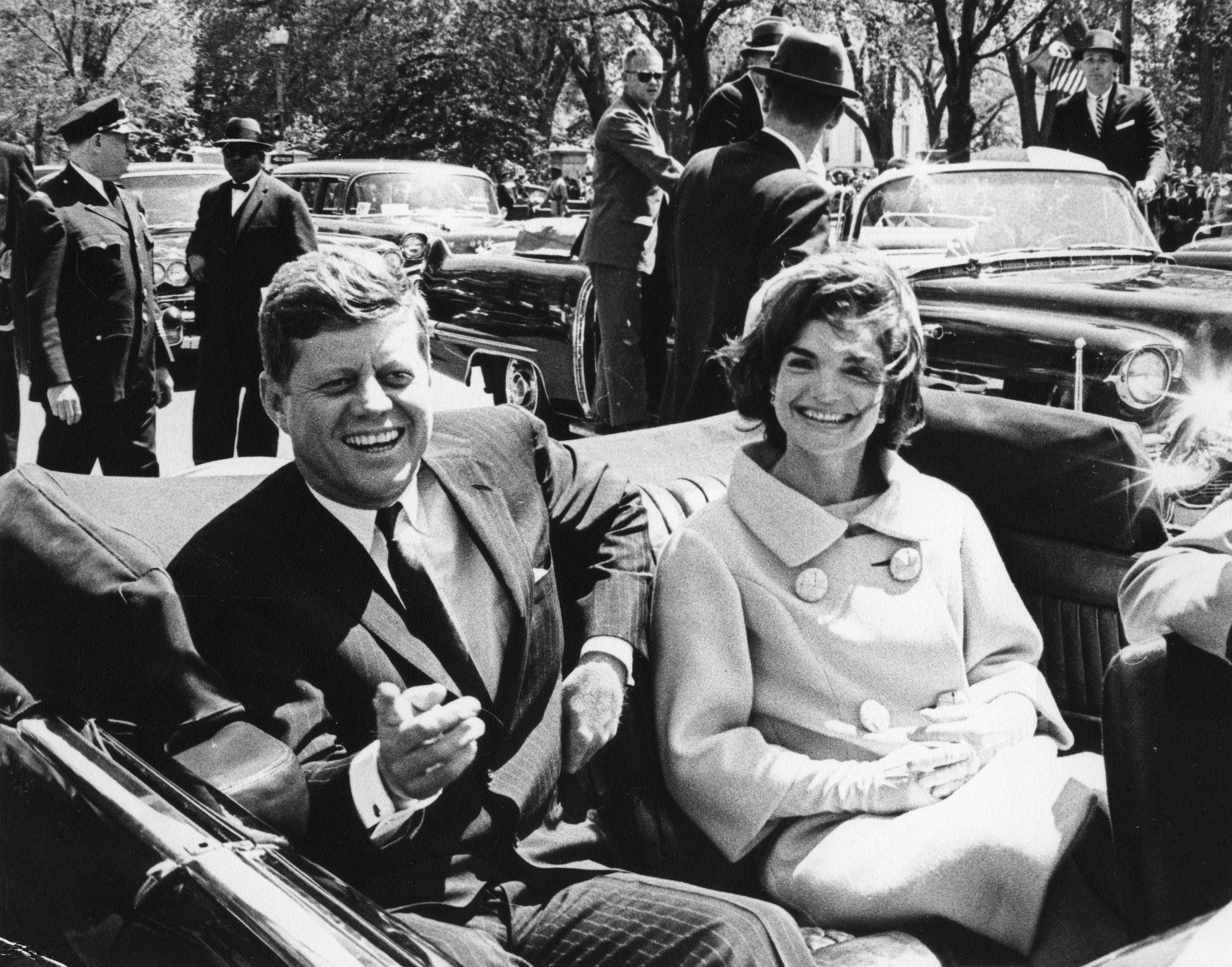Former United States President John F. Kennedy and first lady Jackie Kennedy sit in a car in front of Blair House during the arrival ceremonies for Habib Bourguiba, president of Tunisia, in Washington, in this handout image taken on May 3, 1961. November 22, 2013 will mark the 50th anniversary of the assassination of President Kennedy. REUTERS/Abbie Rowe/The White House/John F. Kennedy Presidential Library (UNITED STATES - Tags: POLITICS ANNIVERSARY)    ATTENTION EDITORS - THIS IMAGE WAS PROVIDED BY A THIRD PARTY. FOR EDITORIAL USE ONLY. NOT FOR SALE FOR MARKETING OR ADVERTISING CAMPAIGNS. THIS PICTURE IS DISTRIBUTED EXACTLY AS RECEIVED BY REUTERS, AS A SERVICE TO CLIENTS