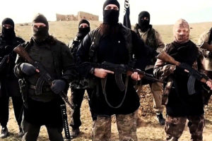 Mandatory Credit: Photo by REX USA (2642870a) Hayat Boumeddiene, far right Hayat Boumeddiene 'appears in Islamic State film' - 06 Feb 2015 The latest video released by French-speaking Islamic state (ISIS), fighters may be Hayat Boumeddiene, who is believed to have knowledge about the deadly January 9, 2015 attack on a Paris kosher grocery,The video, titled "Blow Up France 2," was released Tuesday and shows an ISIS fighter praising previous attackers in France and calling for new attacks. The video shows a woman standing next to the speaker, wearing camouflage clothing and holding a weapon. French authorities are investigating the possibility this woman could be Hayat Boumeddiene. Her husband, Amedy Coulibaly, killed four hostages January 9 at a kosher grocery in Paris, authorities said. He was killed by police in a rescue and the remaining hostages fled to safety.